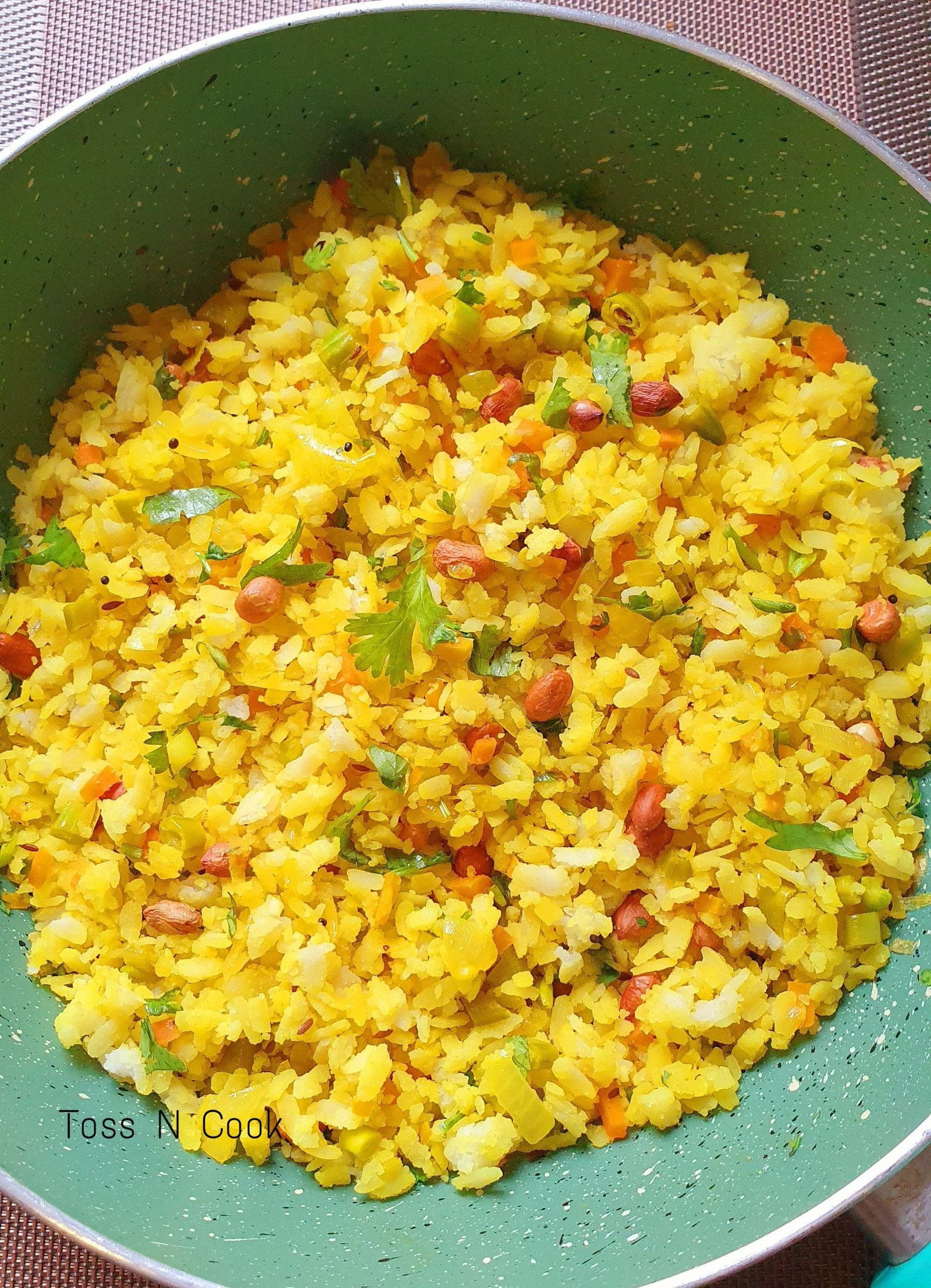 Vegetable poha served Show this image for google SERP for Vegetable Poha