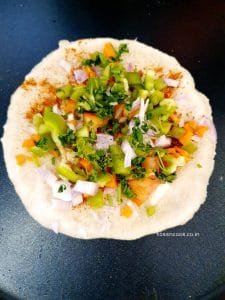 Cooked uttapam Sprinkle some masala on uttapam we prepared and add veggies