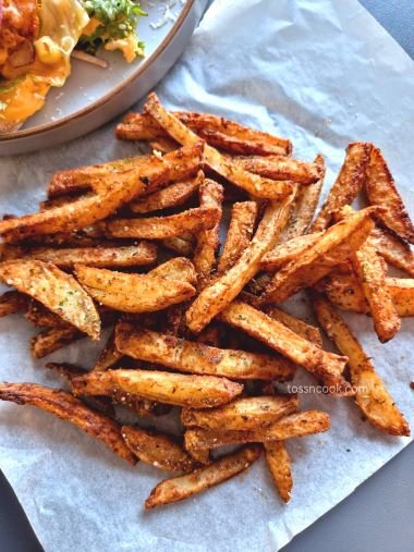 Air Fryer Jamaican Jerk Fries served as a side dish