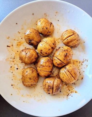 Marinated Baby Potatoes in a white bowl